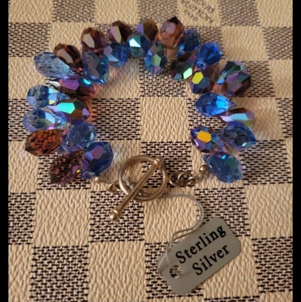 Swarovski tears shaped multifaceted AB cut crystals